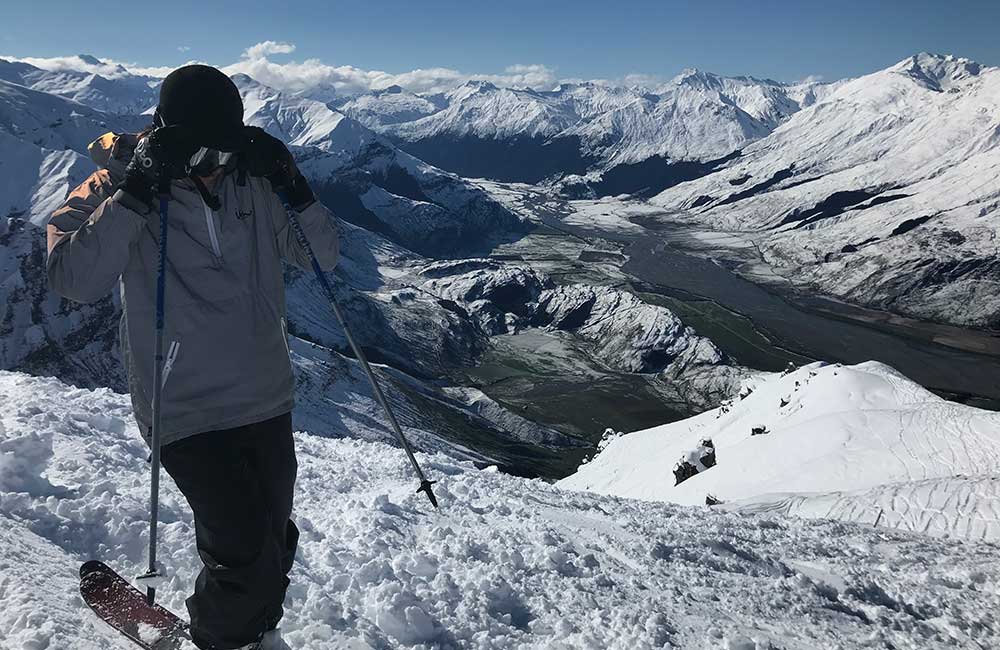 Leo McDonald standing on mountain